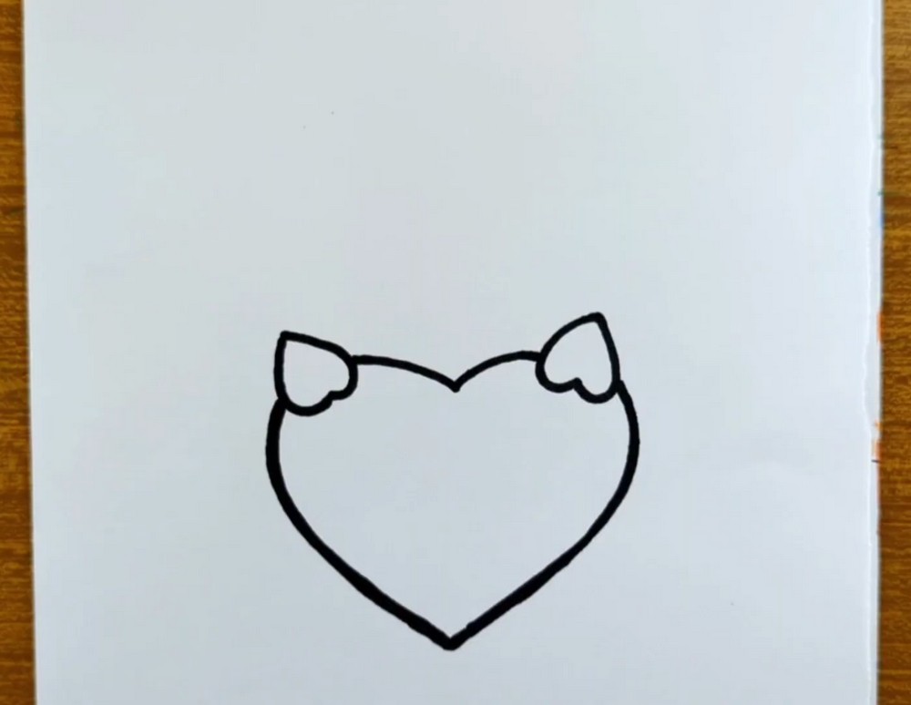 Kitty Holding Heart Drawing